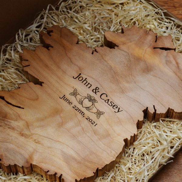 Handmade wooden map of Ireland engraved with bride & groom's names, date of wedding, & Claddagh ring symbol.