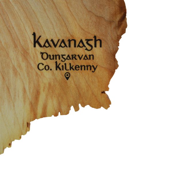 Close up of Irish surname Kavanagh engraved on wooden map of Ireland.