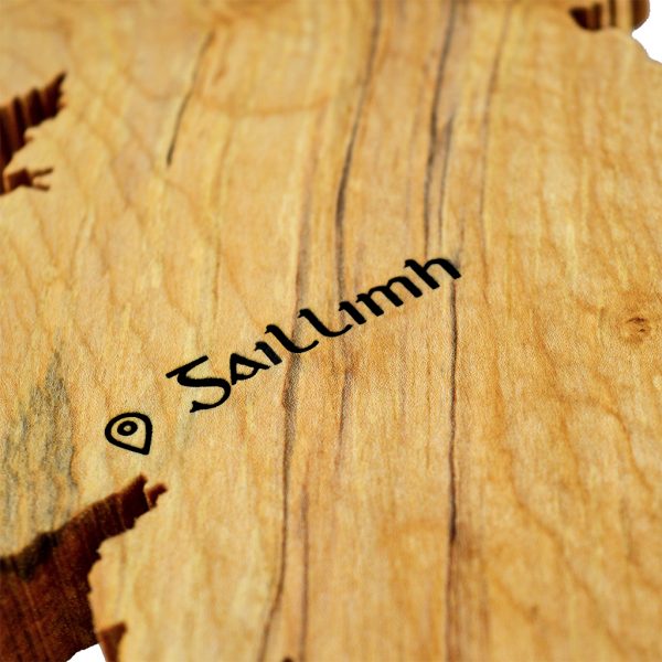 Close up of Irish word for Galway engraved using ancient Gaelic font, on a handmade wooden map of Ireland unique Irish gift.