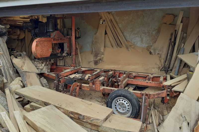 Planks of milled wood with a wood mizer saw.