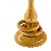 Two captive rings around stem of wooden Irish wedding goblet.