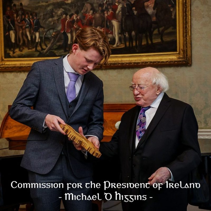 President Michael D. Higgins being presented with a handcrafted wooden map of Ireland created by Magill Woodcraft Ireland.
